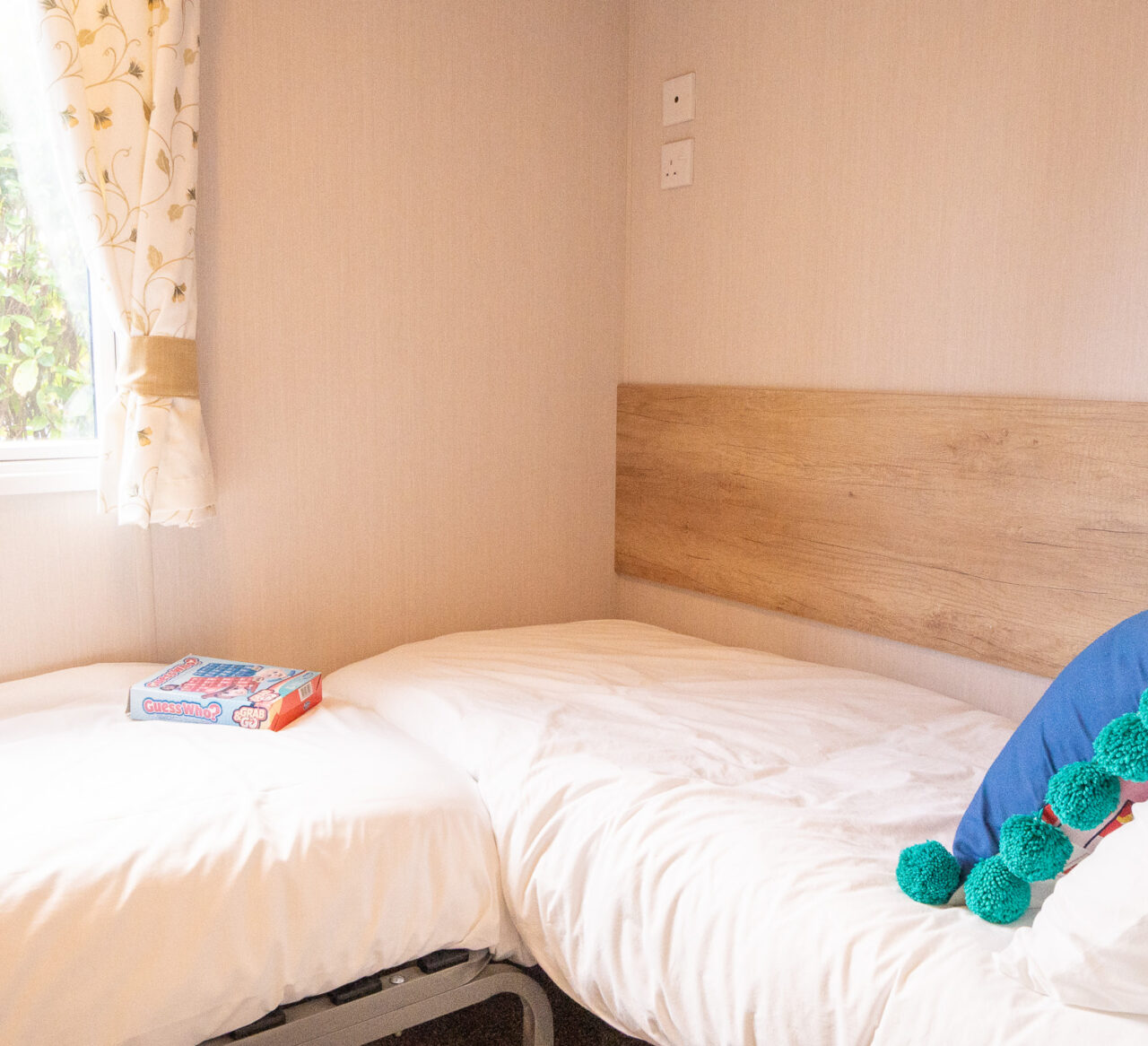 Swift Burgundy Caravan twin bedroom