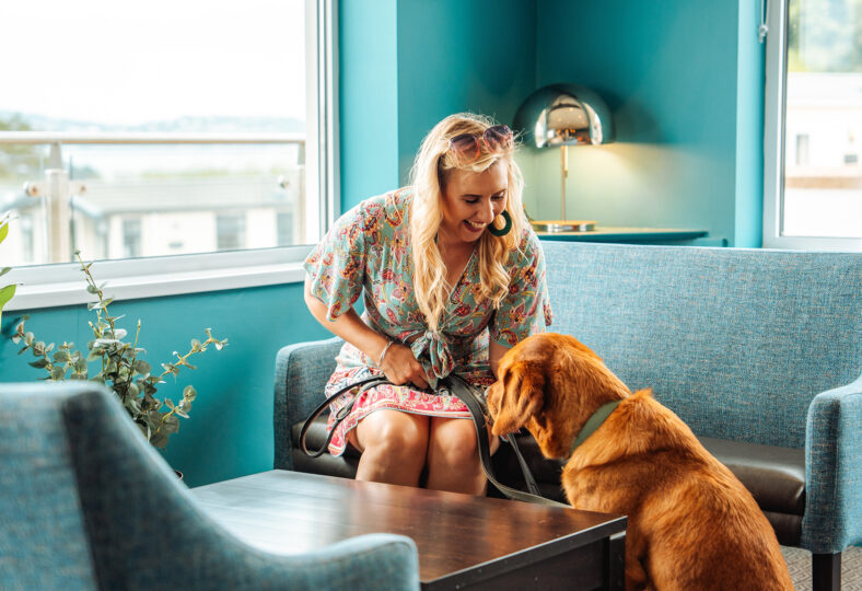 Dog friendly holiday homes for sale - Lady and dog in a dog friendly holiday home at Beverley Holidays