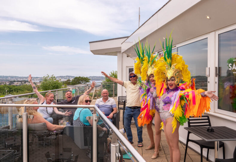 Holiday Home Owner benefits - Group of holiday home owners smiling at the camera