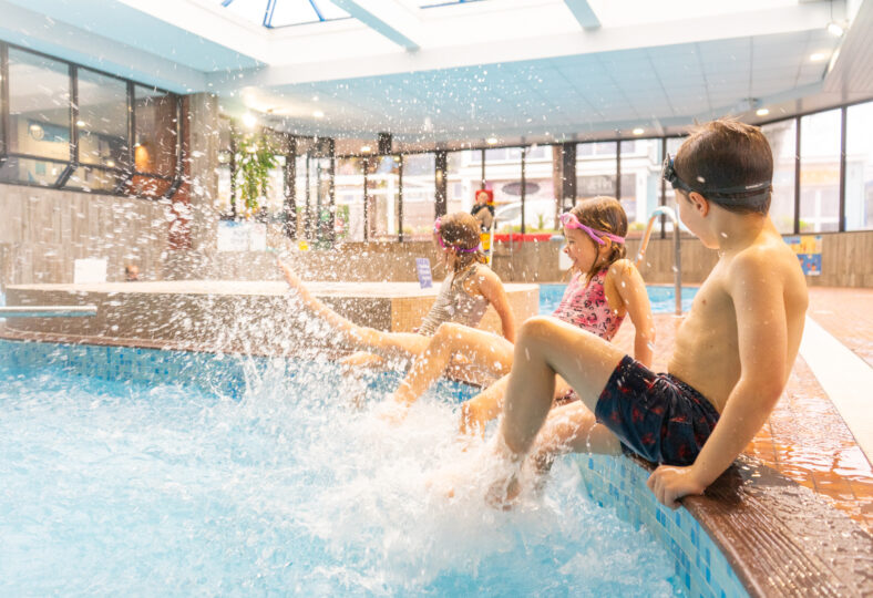 Pools & Leisure - Oasis Indoor Pool with kids sat splashing