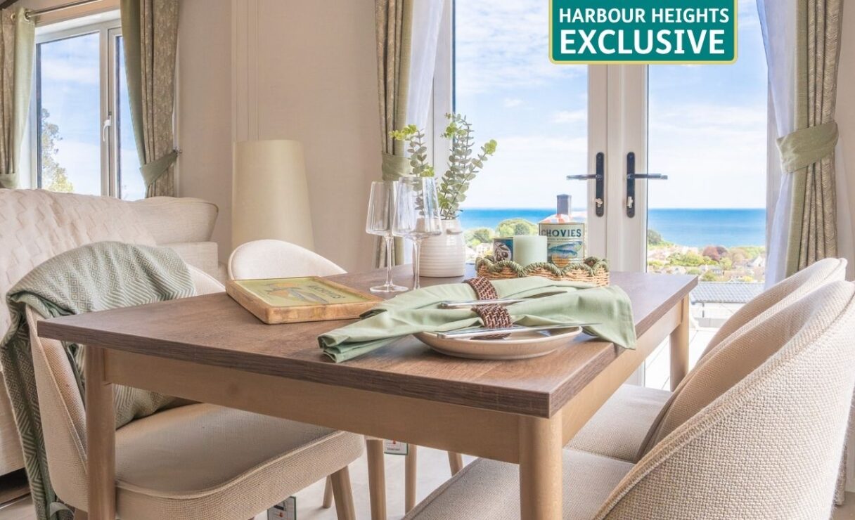 Regal Harbour lodge dining table overlooking the sea