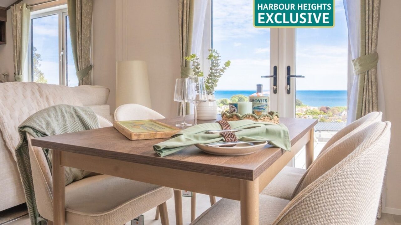 Regal Harbour lodge dining table overlooking the sea
