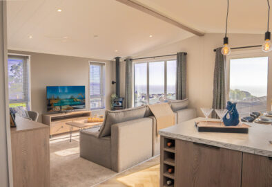 Victory View Lodge open plan living area with sea views