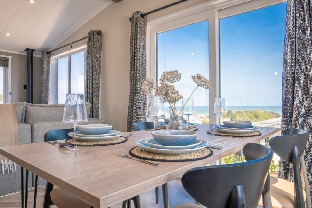 Victory View Lodge dining table with sea view