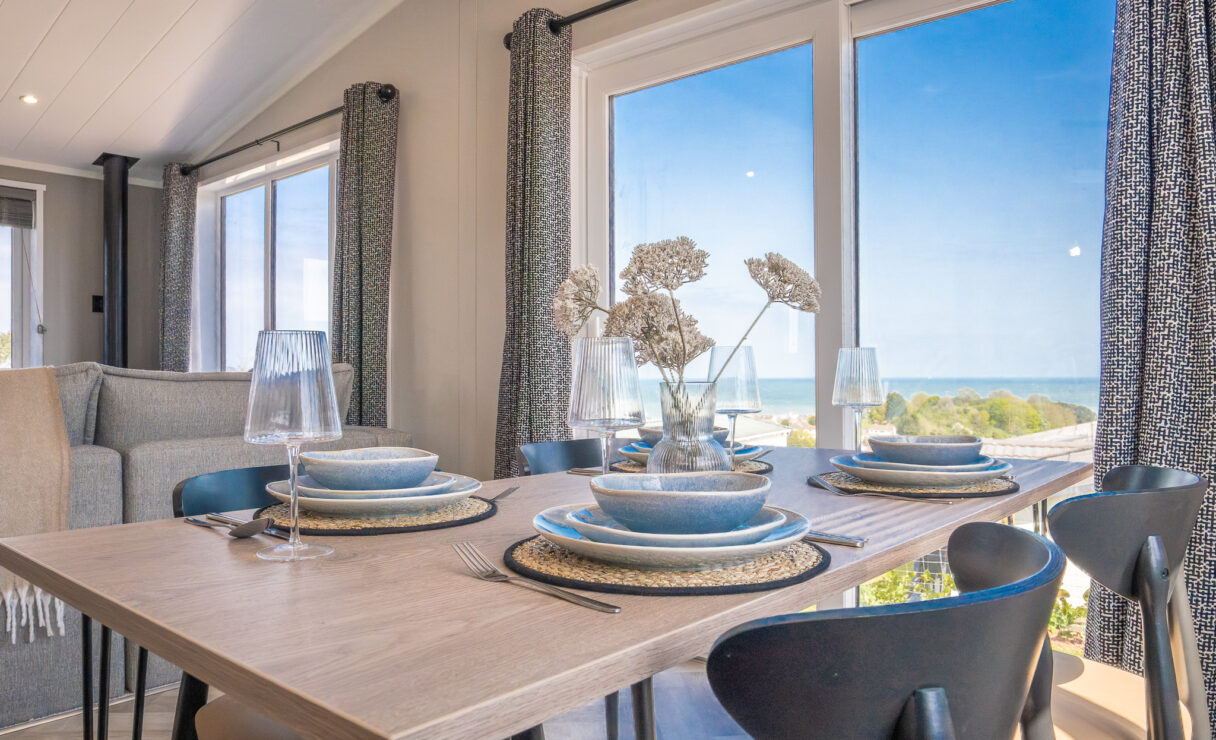 Victory View Lodge dining table with sea view