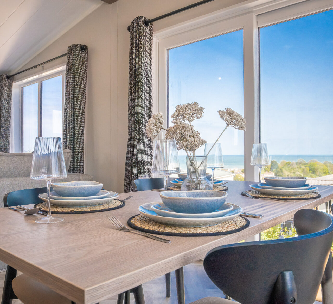 Victory View Lodge dining table with sea view