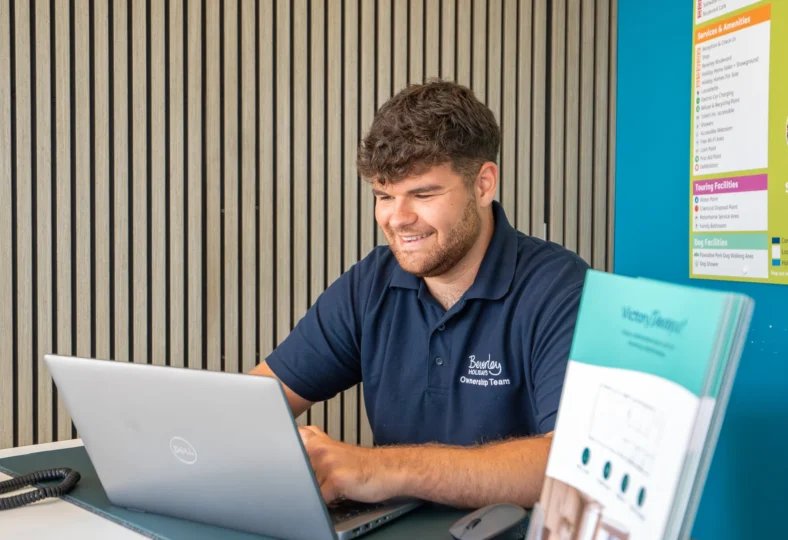 George working in the Holiday Home Sales Office